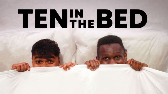 Two people holding the covers up over their nose. Black text reads 'TEN IN THE BED'.